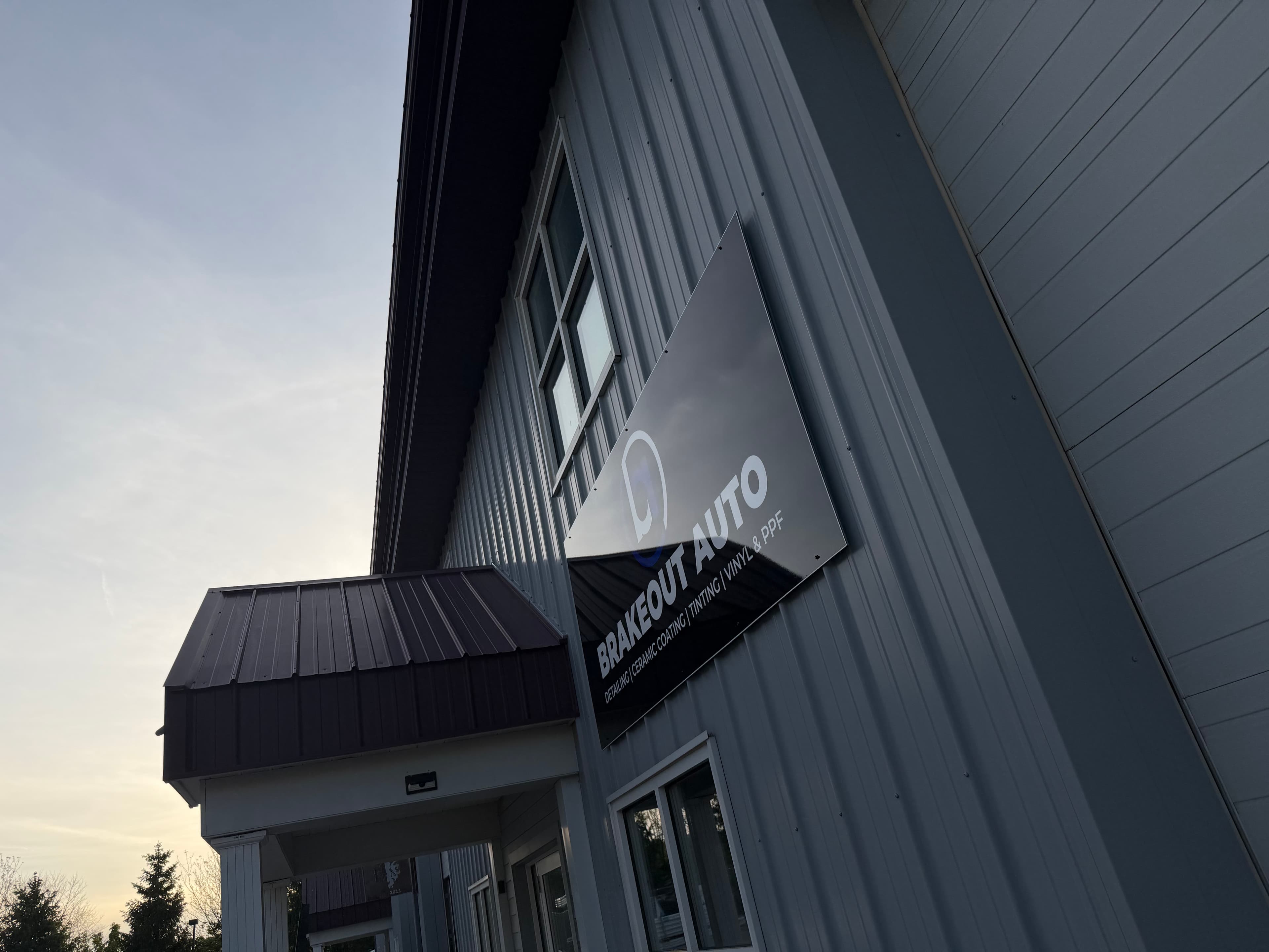 Brakeout Auto installer fitting paint protection film in the State College shop